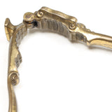 Old Brass Scrolled Top Nutcrackers