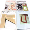 Four books on cabinetmaking and framing on a white background