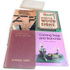 Collection of books on woodcarving and sign-making on a white background