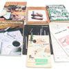 Collection of woodworking books on a white background