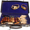 Set of leather working tools in a case with blue interior
