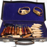 Set of leather working tools in a case with blue interior